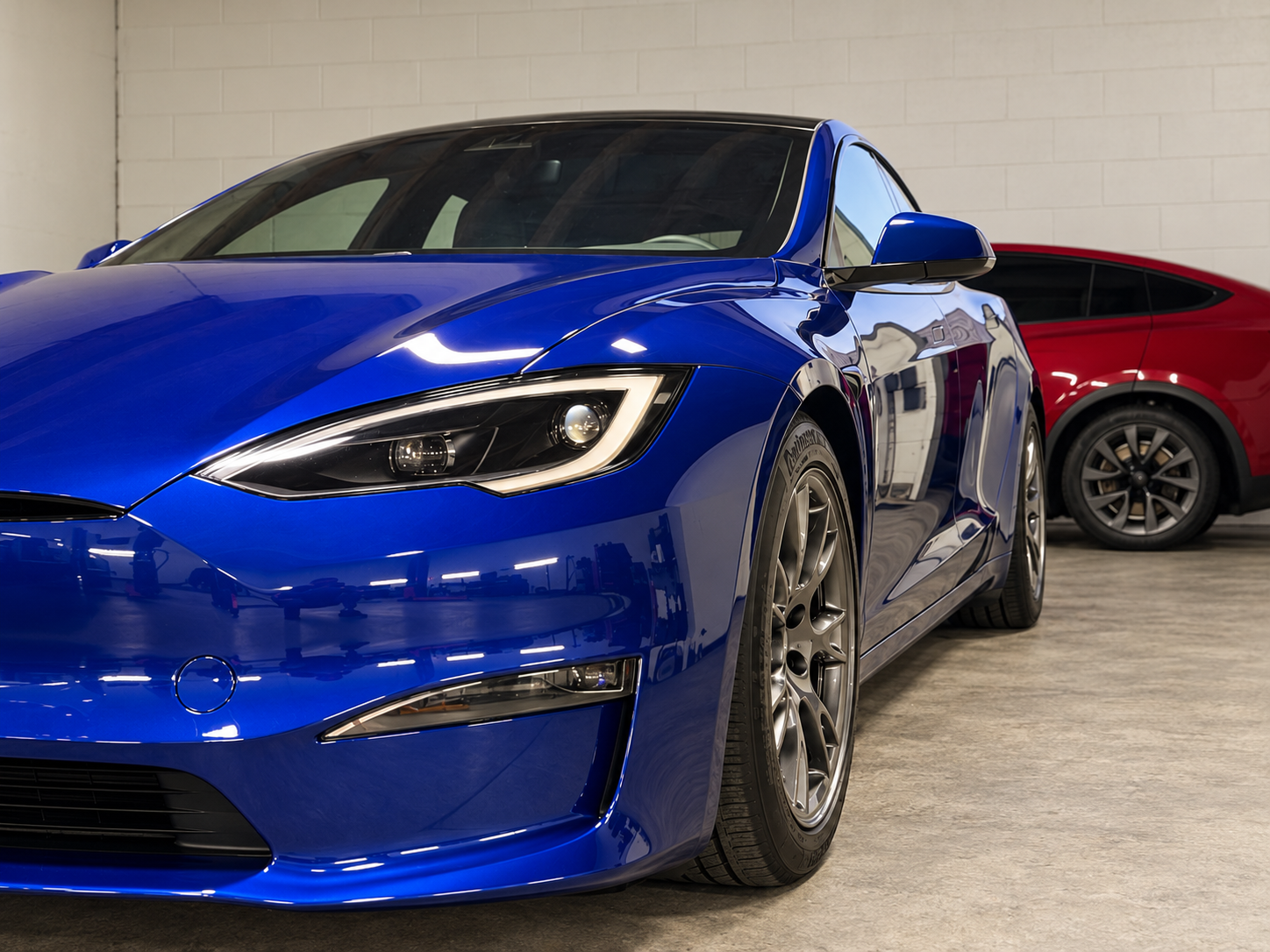 Blue Tesla Model S — JP Automotive Group workshop